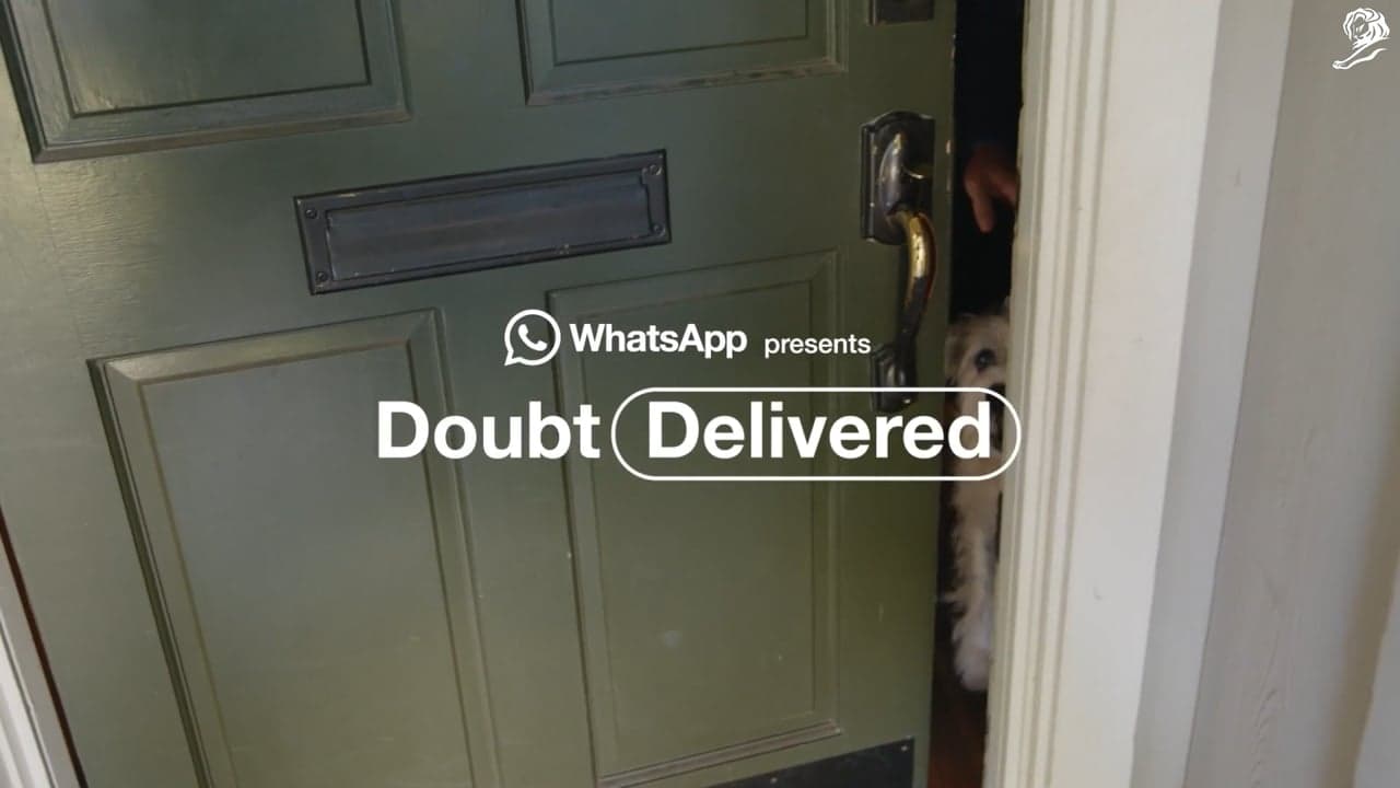 Doubt Delivered title over a front door opening onto a dog.