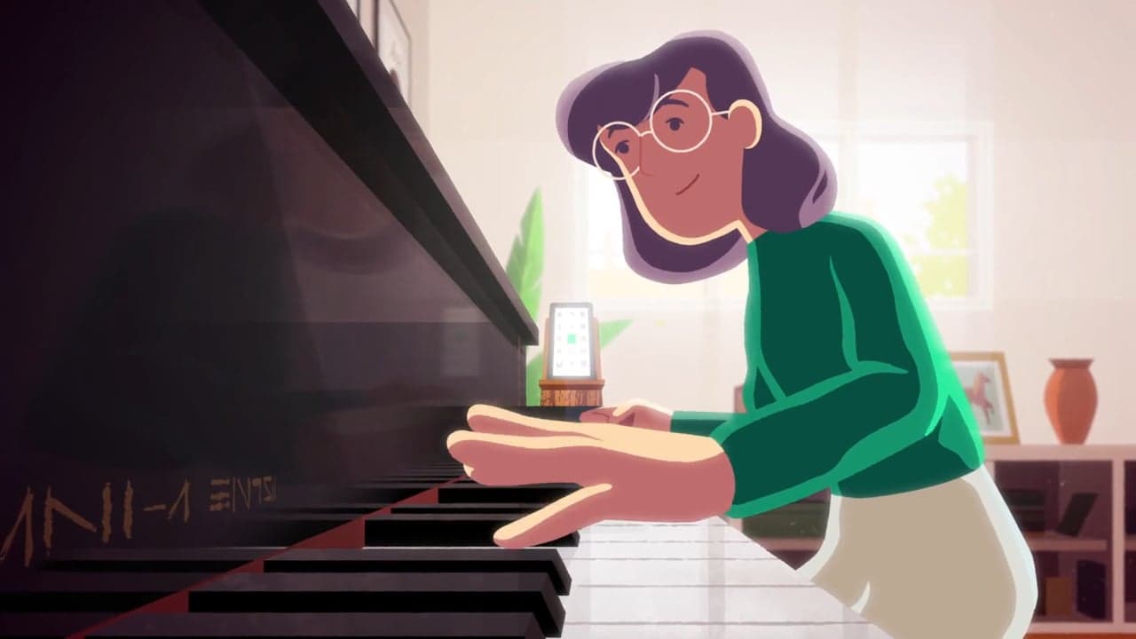 An animated piano teacher plays beside a phone during a video lesson.